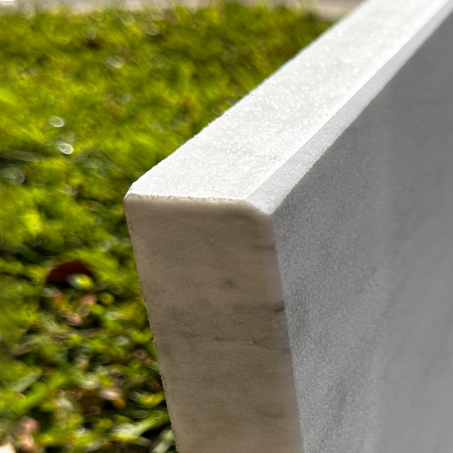 Eased edged pool coping